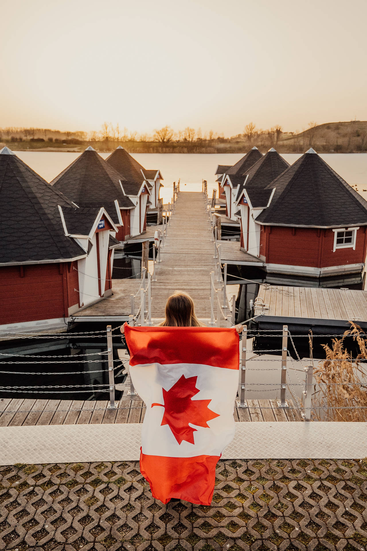 Canadian Flag Woman Village Background