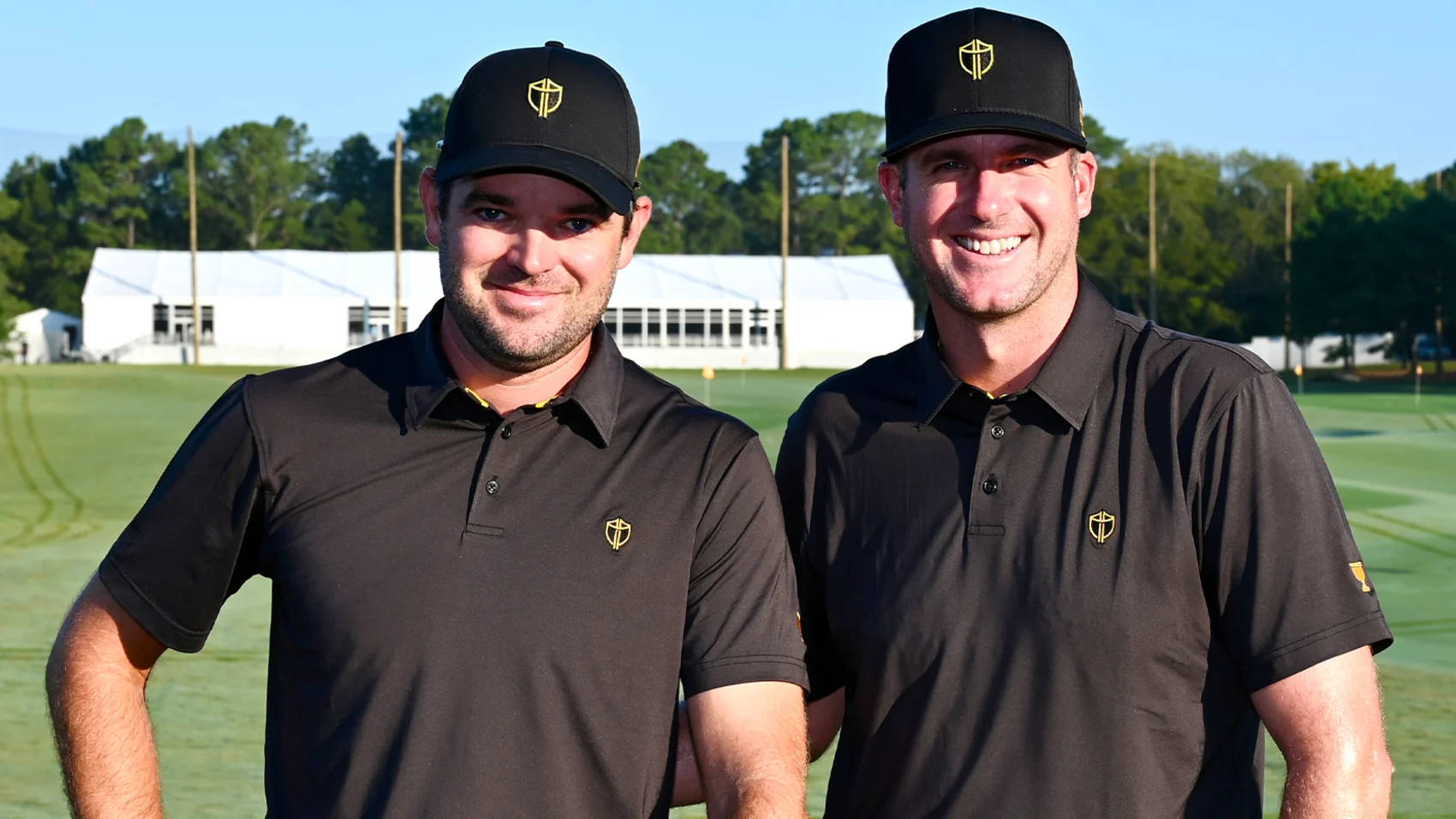 Canadian Golfers Corey Conners And Taylor Pendrith Smiling On The Course Background