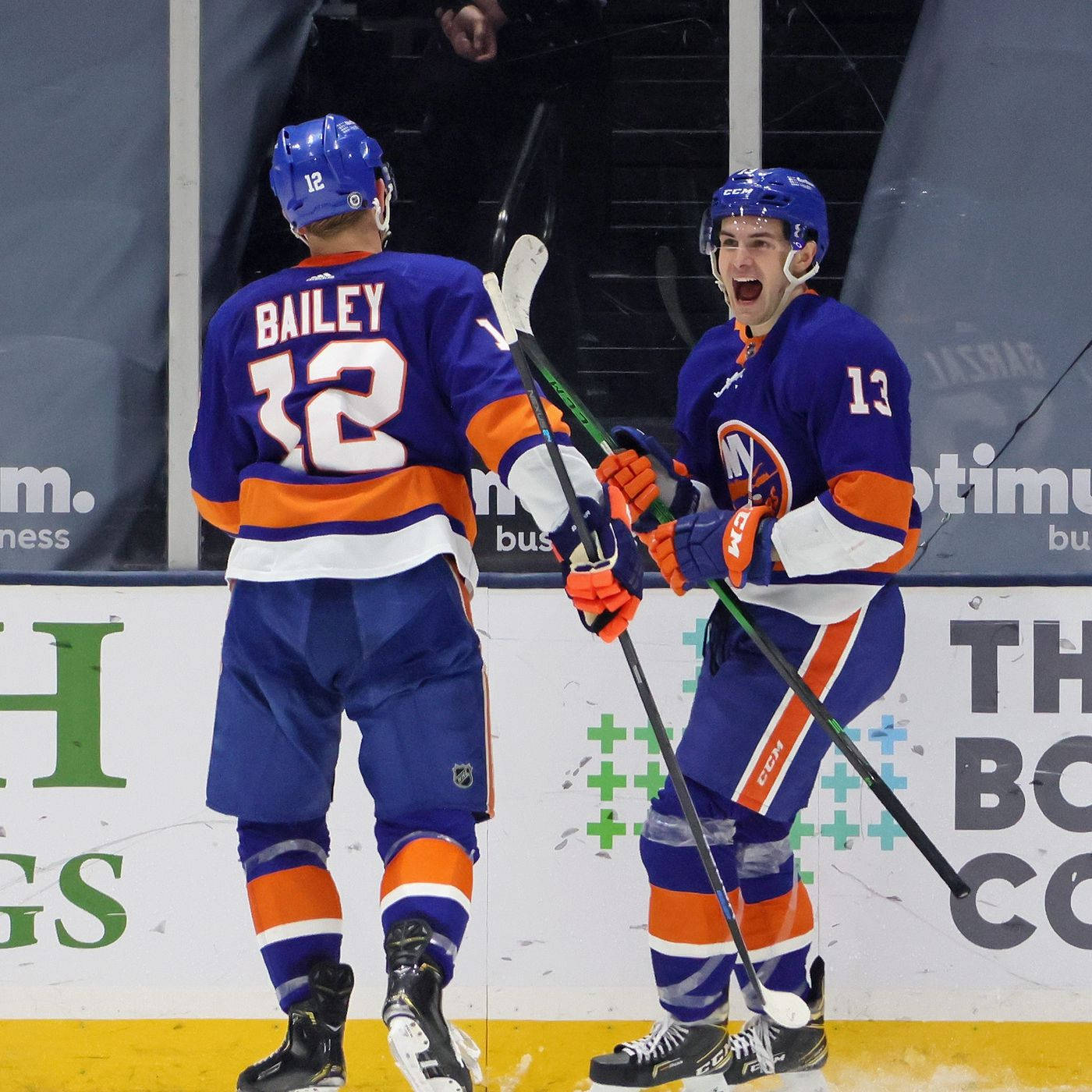 Canadian Ice Hockey Player Mathew Barzal And Teammate Josh Bailey Background