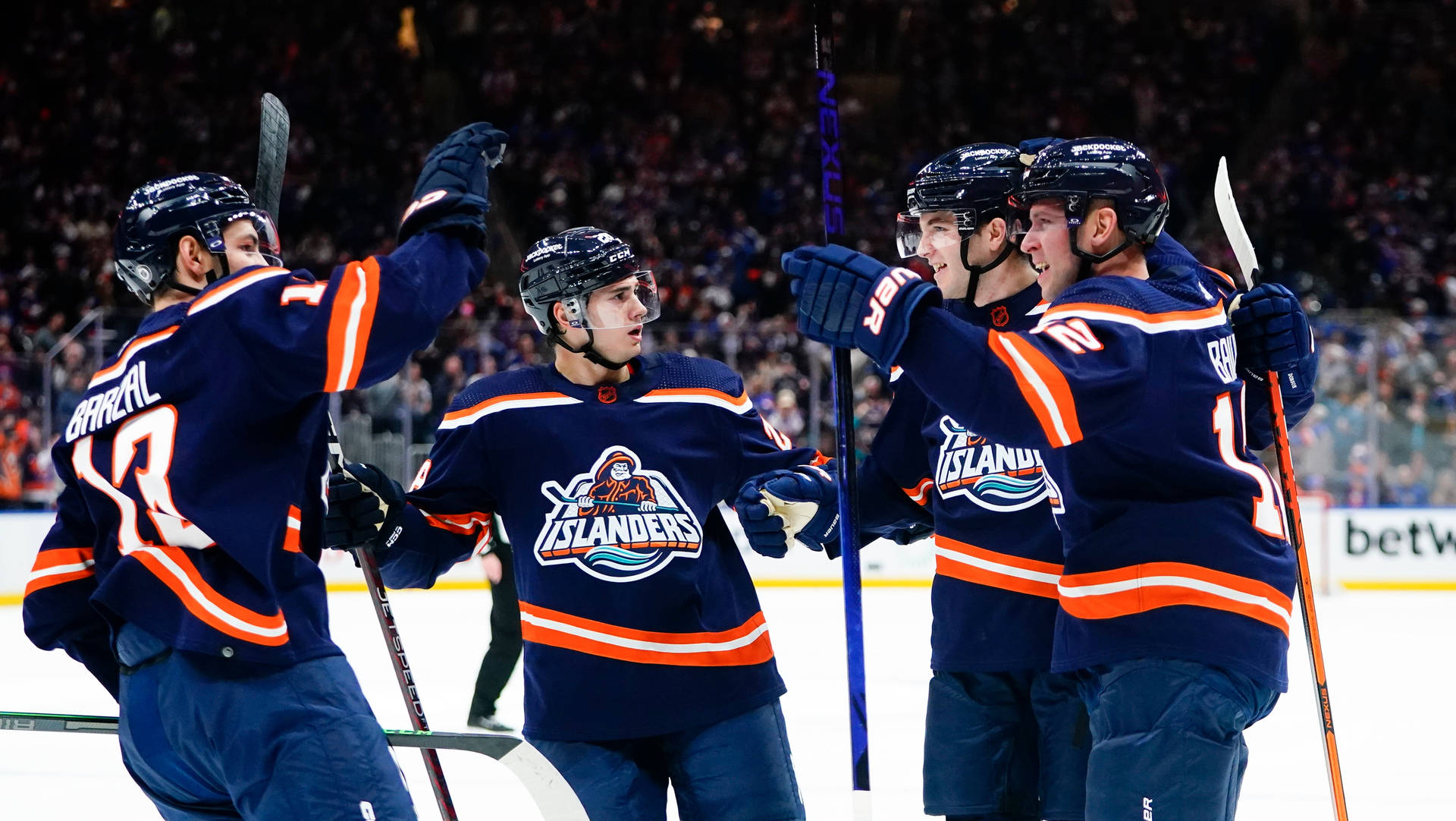 Canadian Ice Hockey Player Mathew Barzal And Teammates Medium Shot