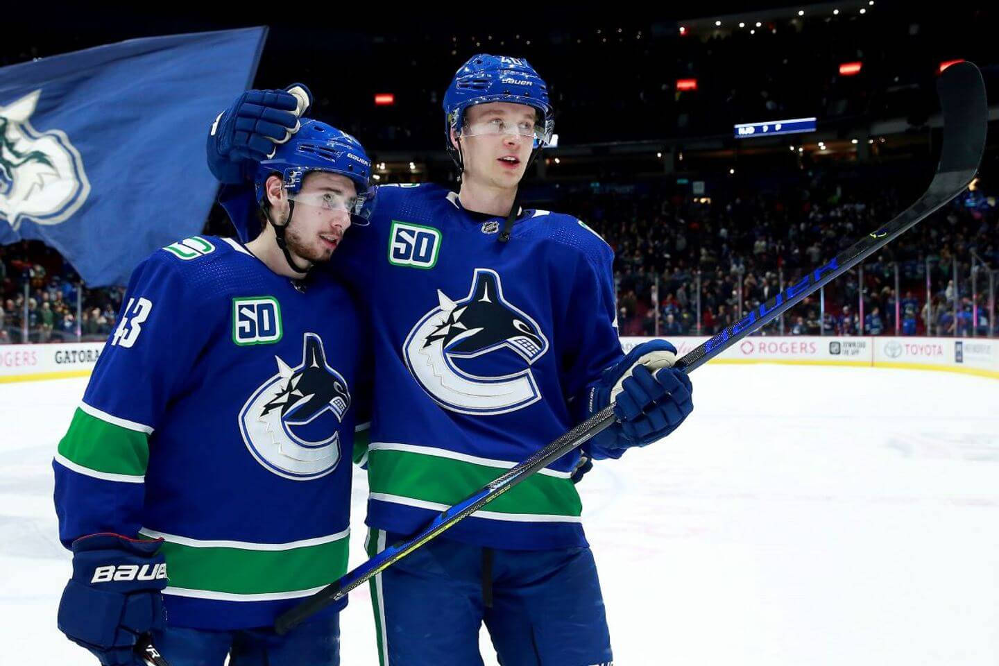 Canadian Nhl Player Elias Pettersson With Quinn Hughes