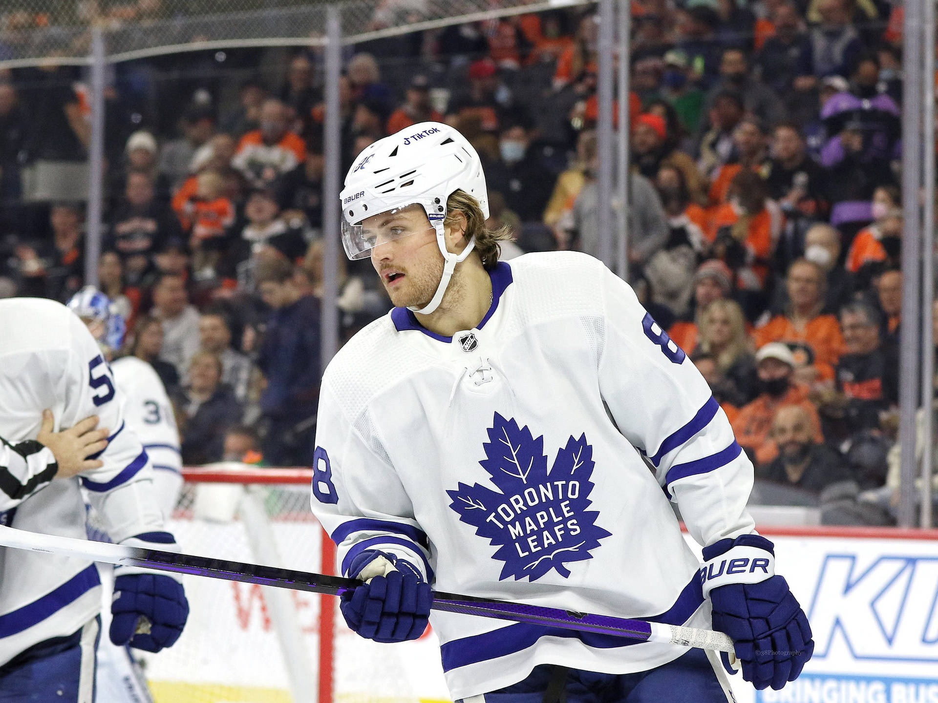 Canadian Nhl Star William Nylander On Ice Rink Background