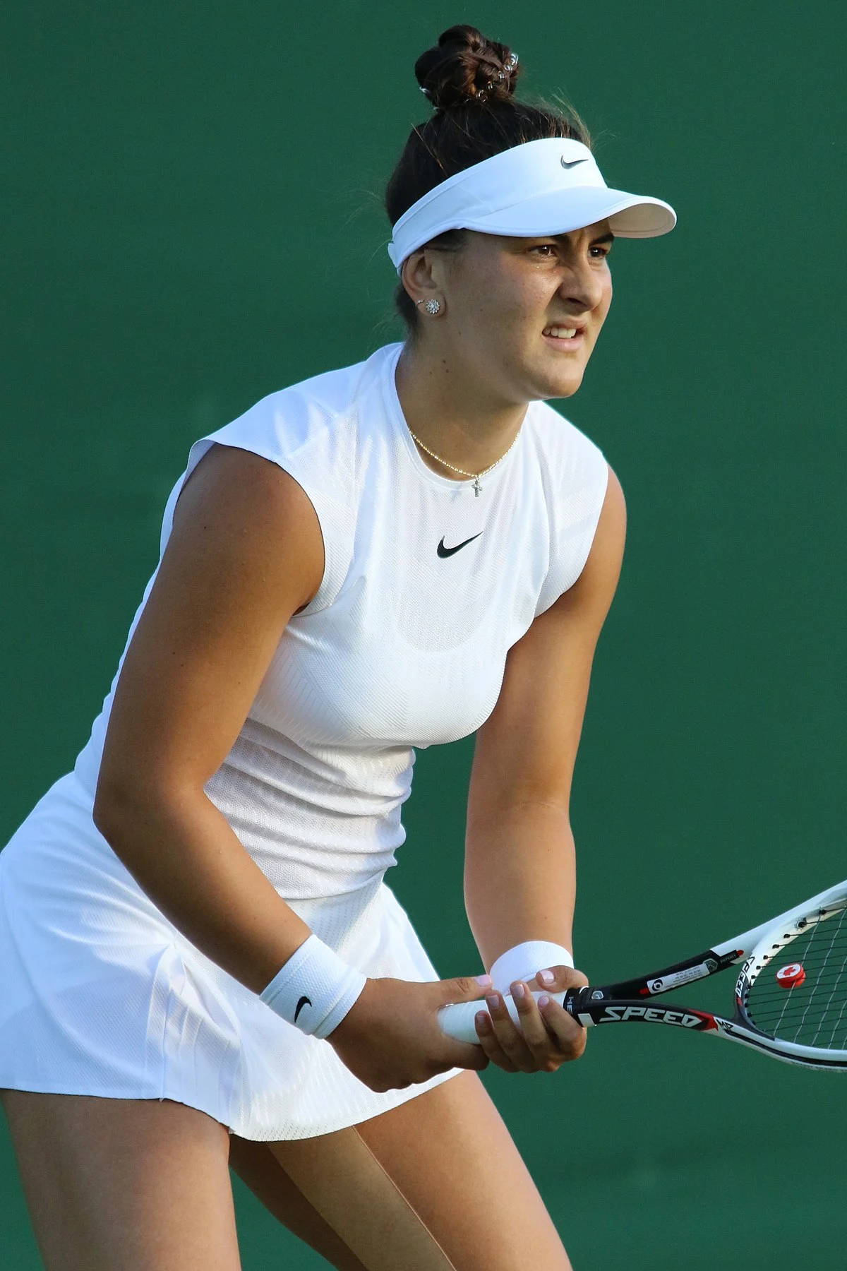 Canadian Tennis Star Bianca Andreescu In An All-white Attire Background