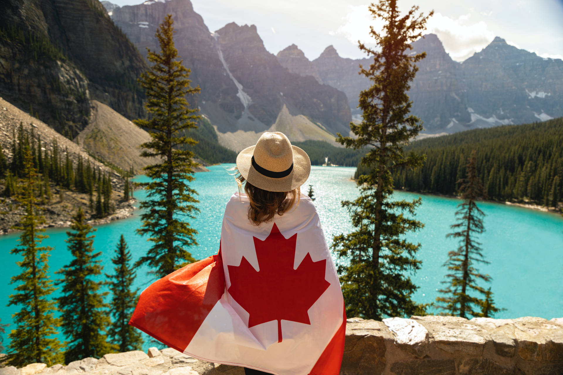 Canadian Woman Lake Tall Trees Background