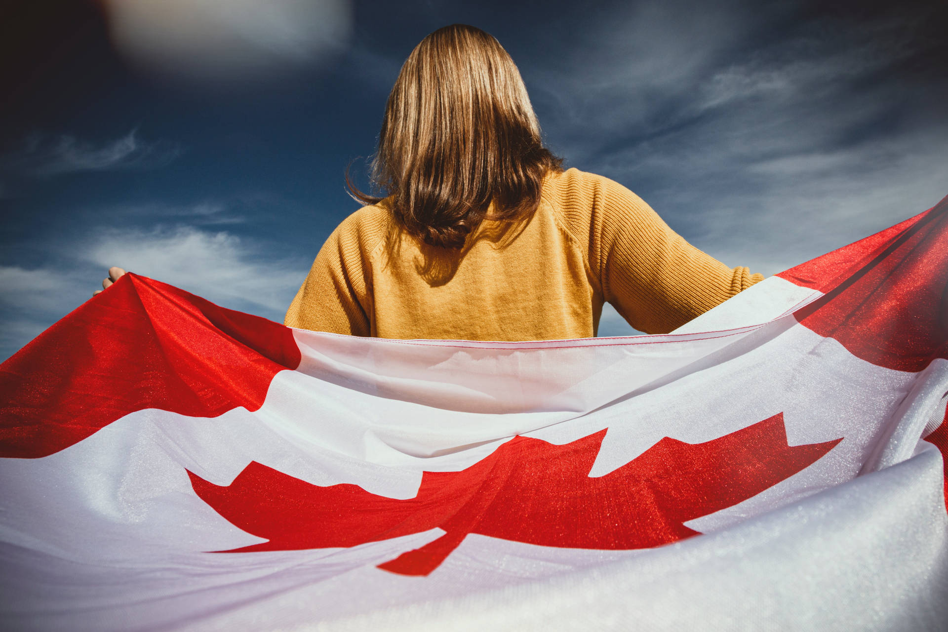 Canadian Woman Yellow Shirt Background