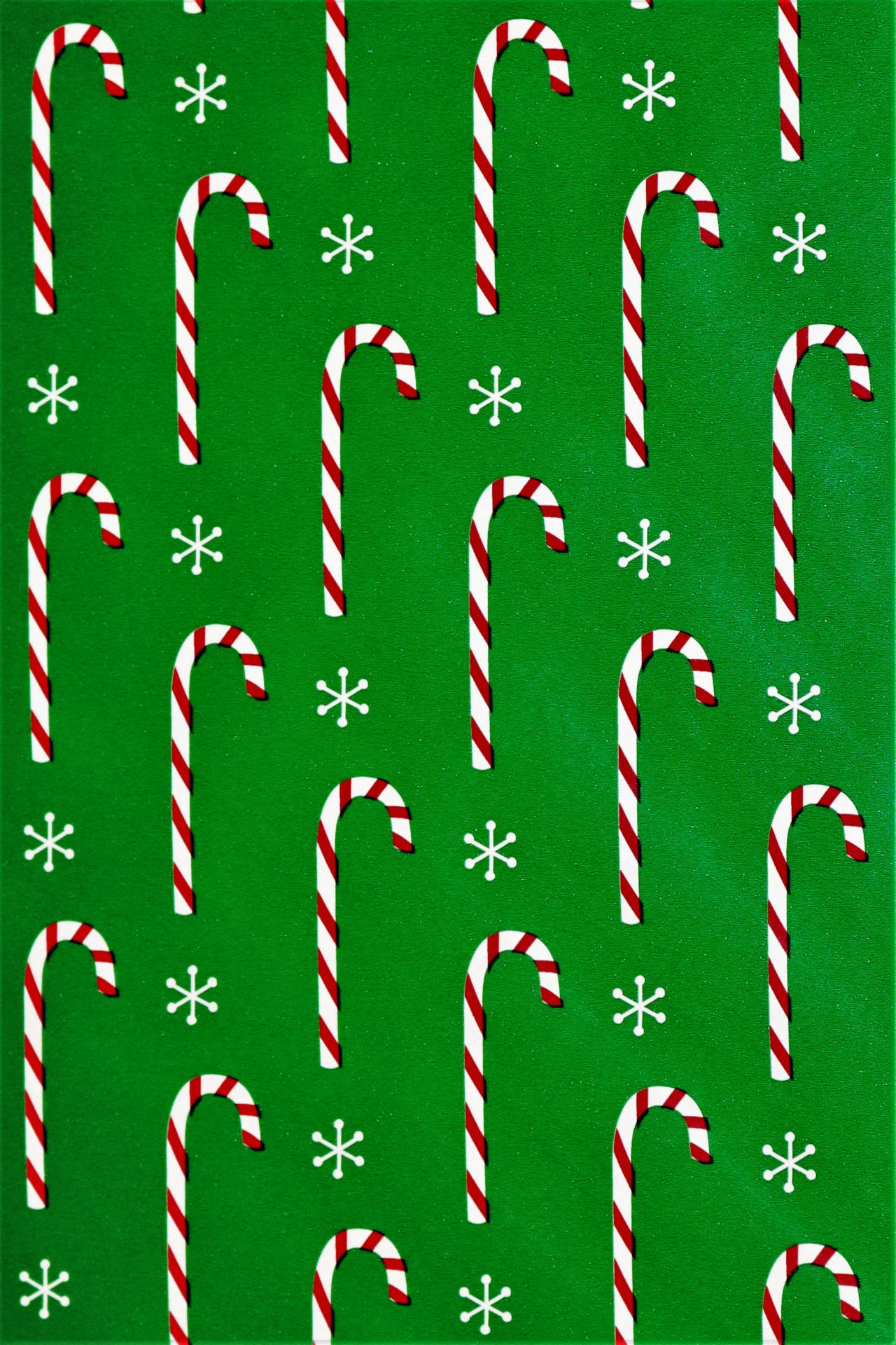 Candy Canes In Green Background Background