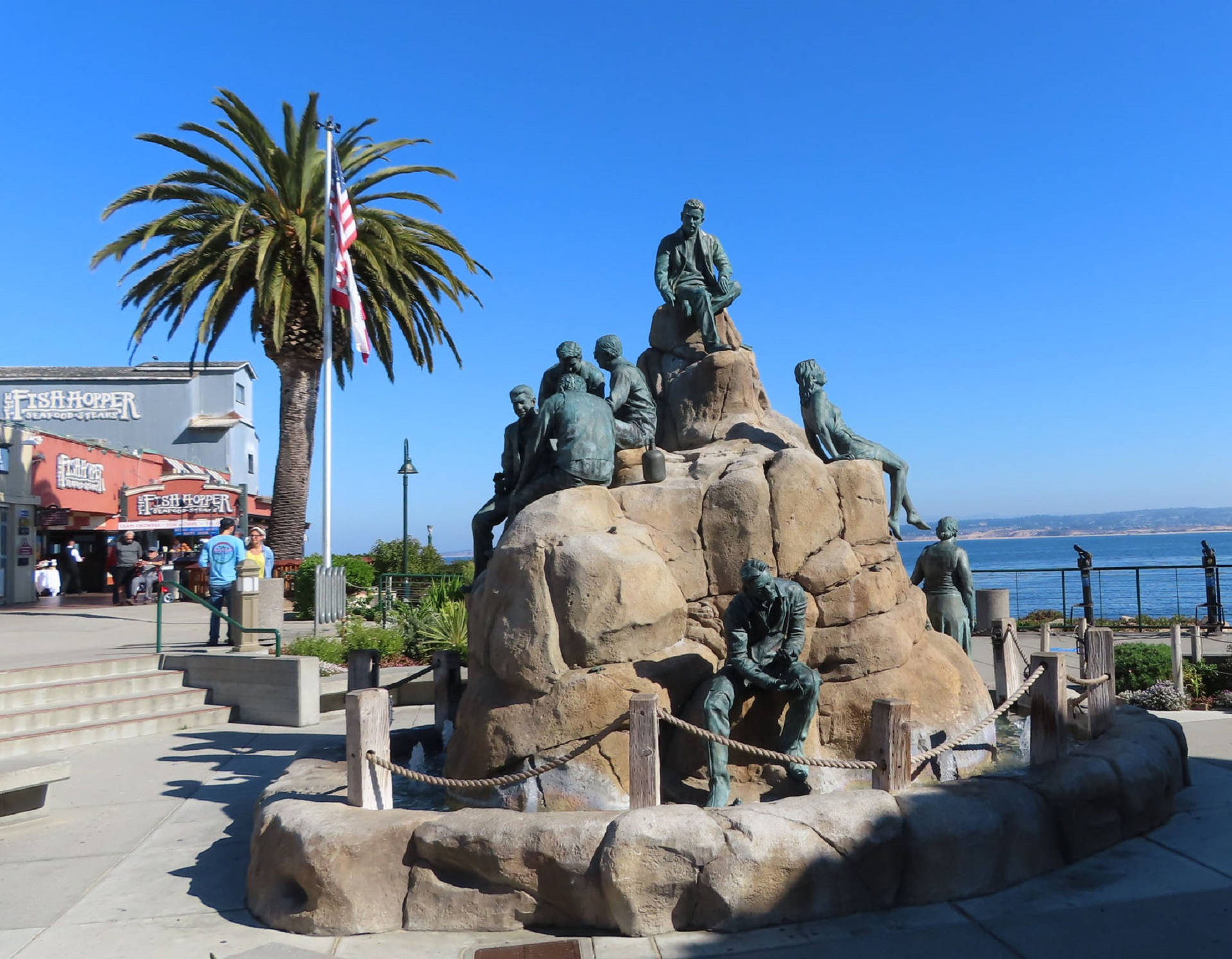 Cannery Row Monument And Blue Sky Background