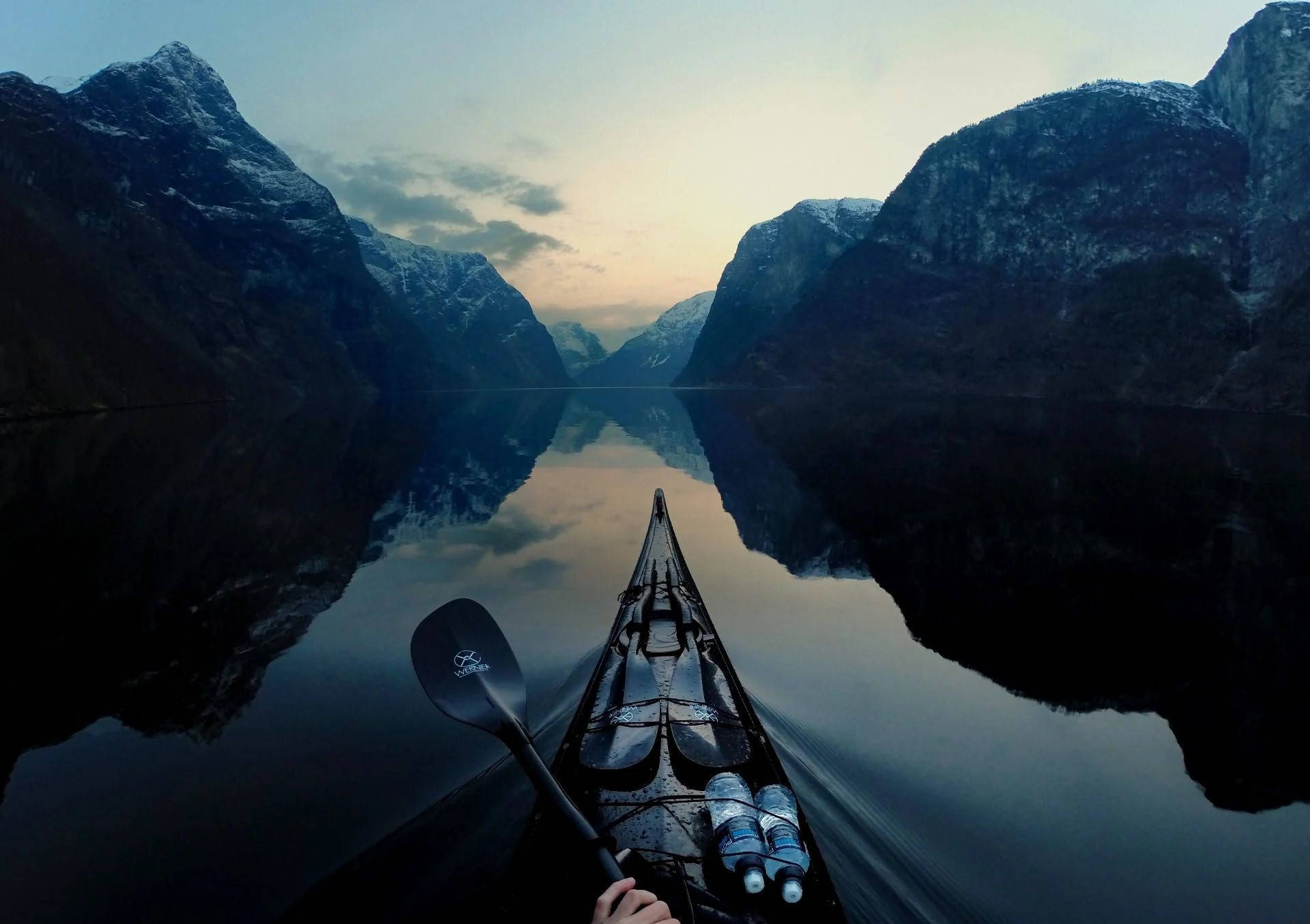 Canoeing In Fjord Background