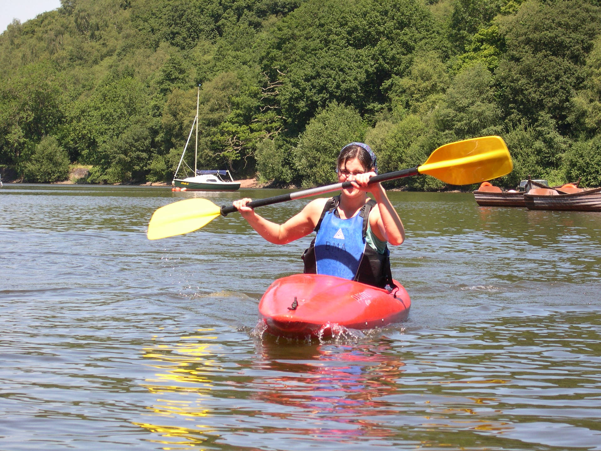 Canoeing Woman Holding A Paddle