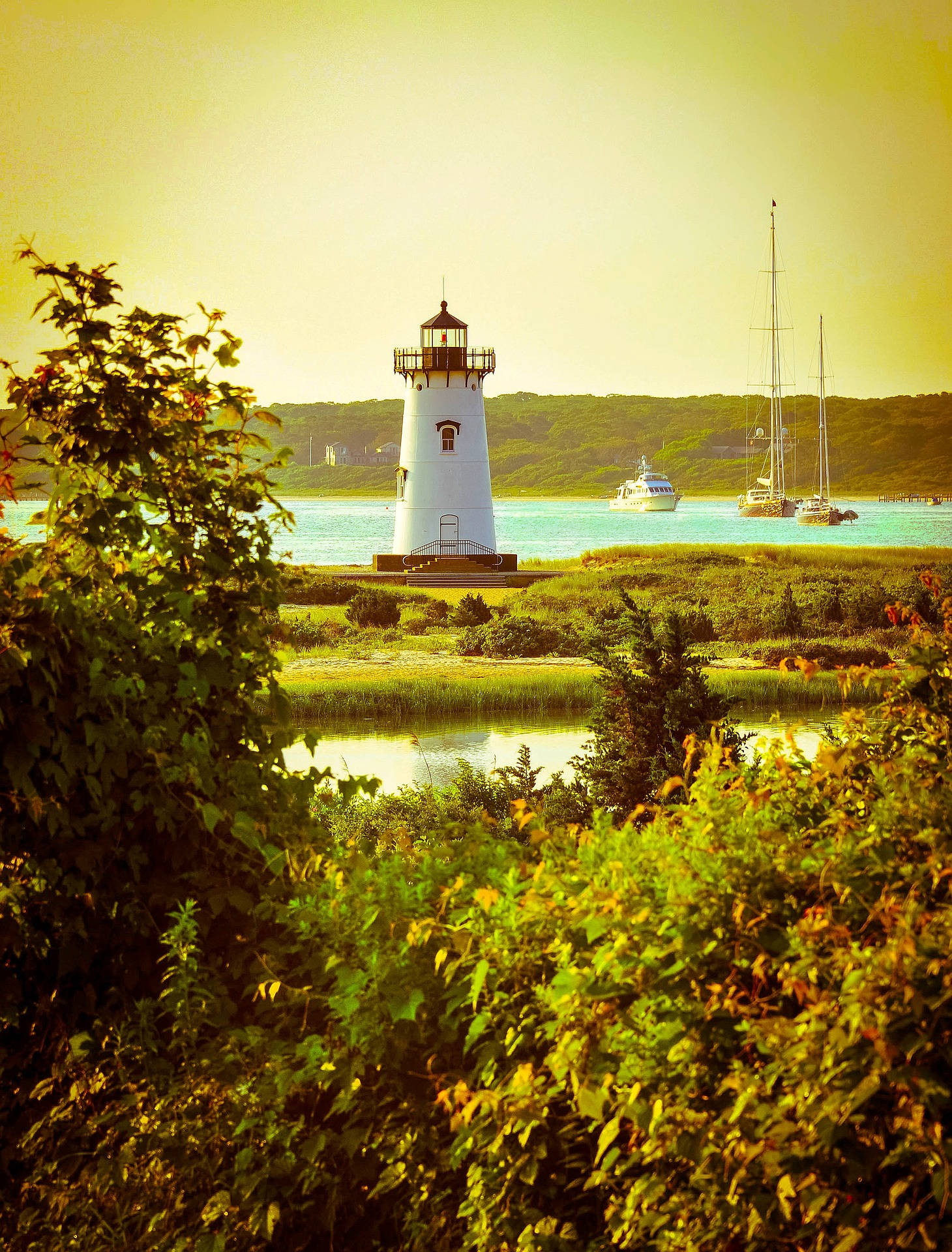 Cape Cod Lighthouse By The Beach Background