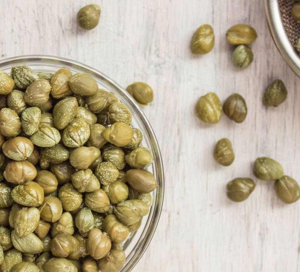 Capers In A Bowl Background