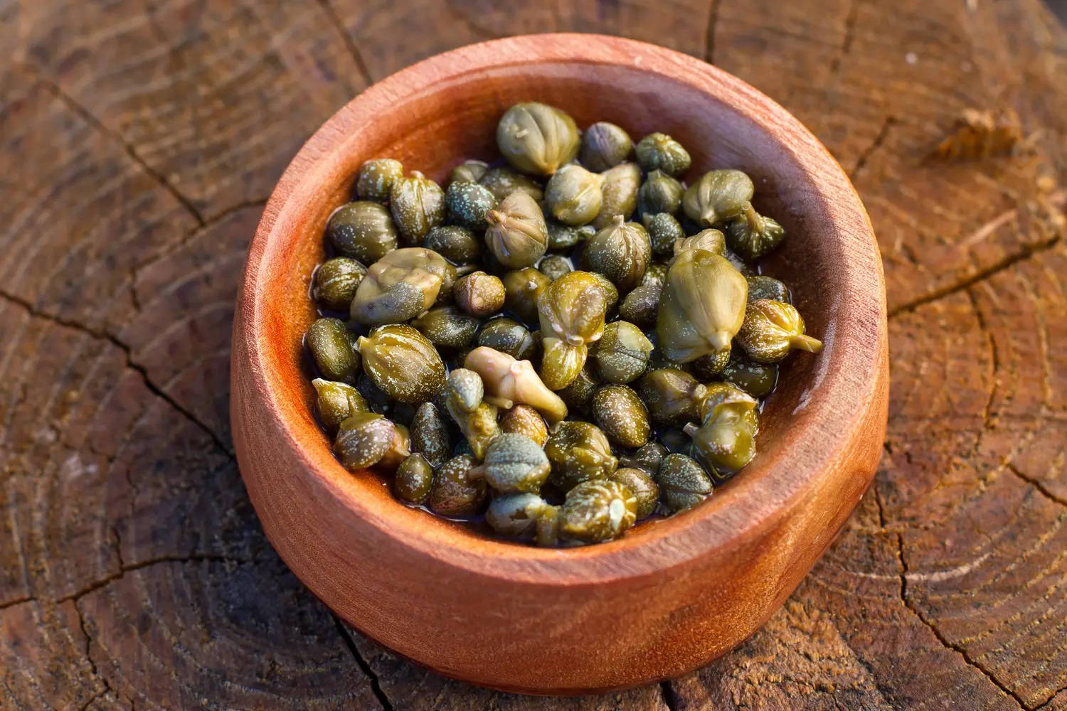 Capers In A Brown Clay Pot