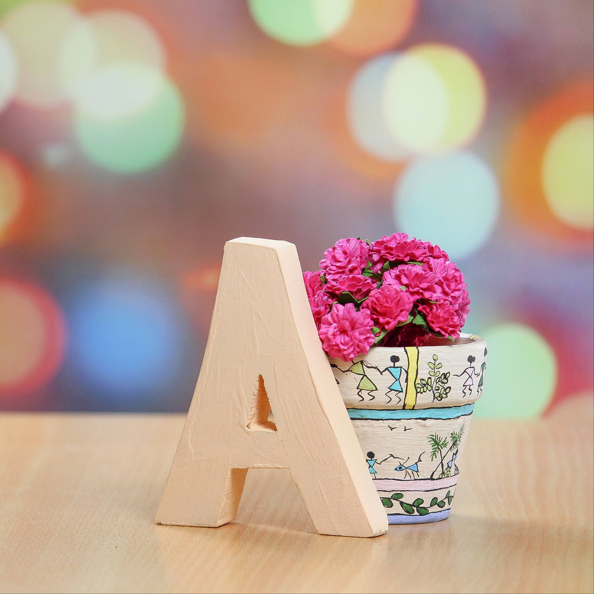 Capital Alphabet Letter A Leaning On Vase Background