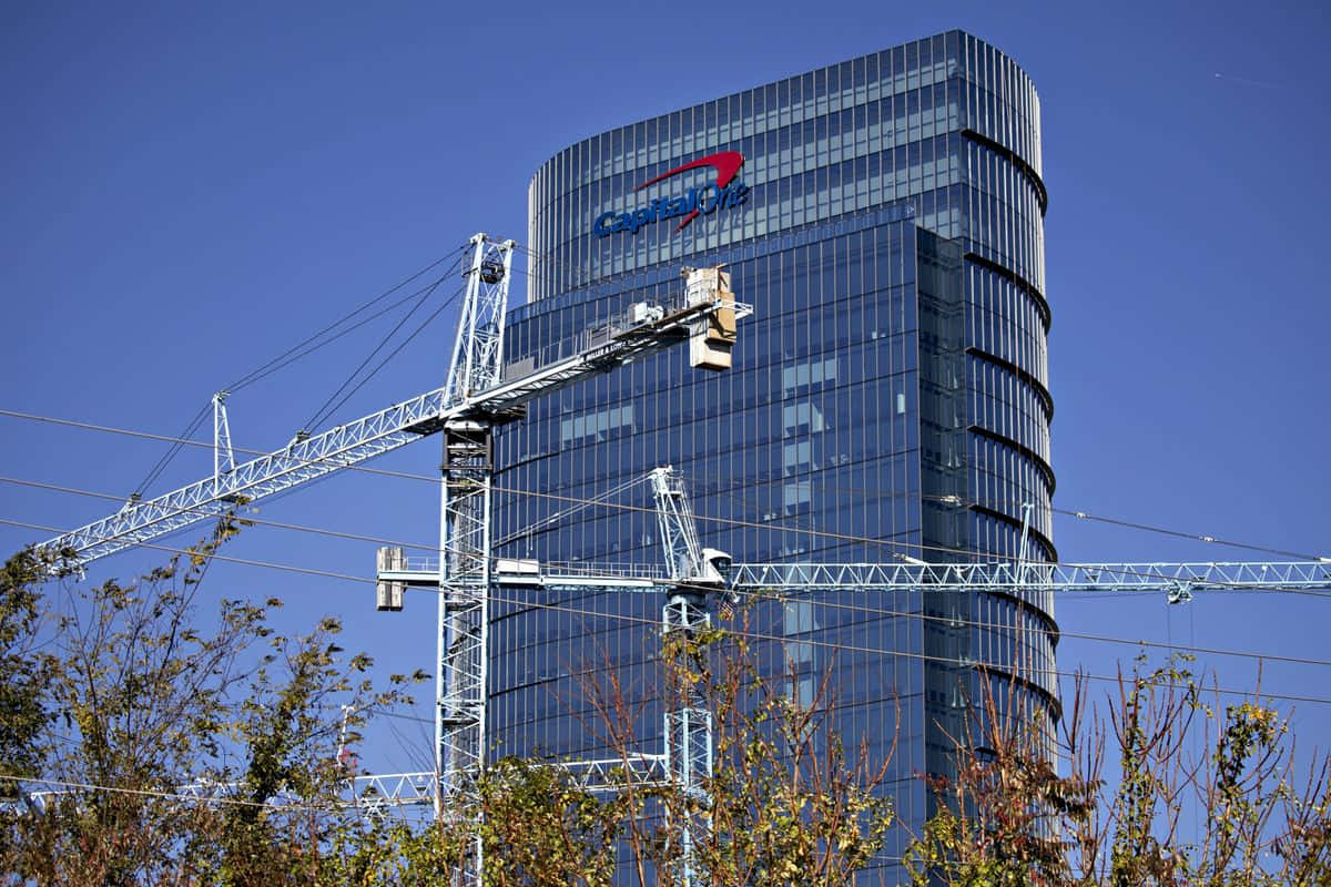 Capital One Logo Displayed On Building Facade Background