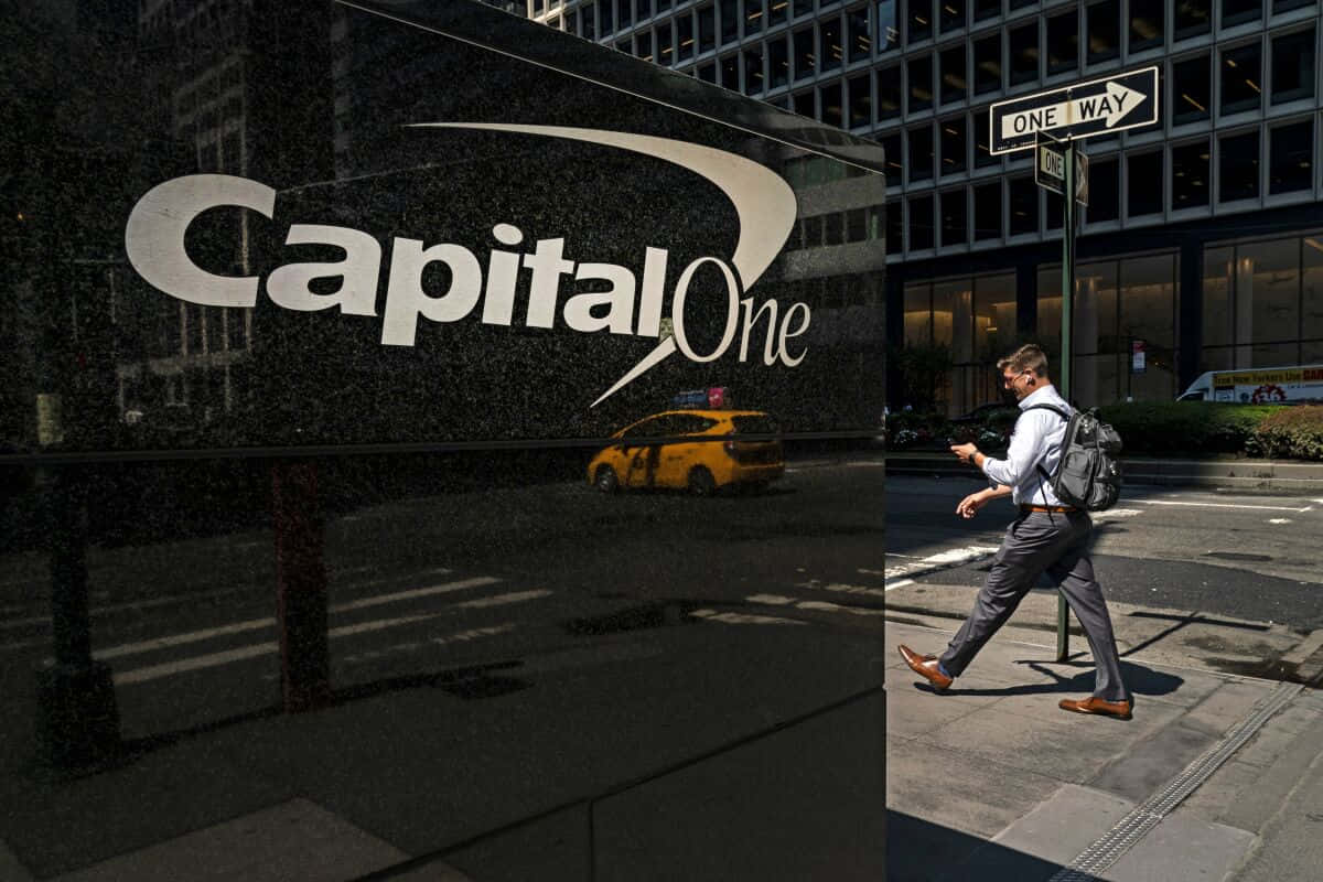 Capital One Sign On Marble Wall Background