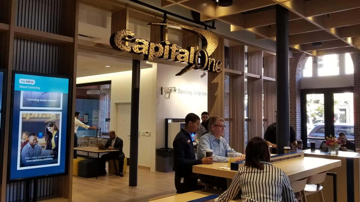 Capital One With People Sitting Background