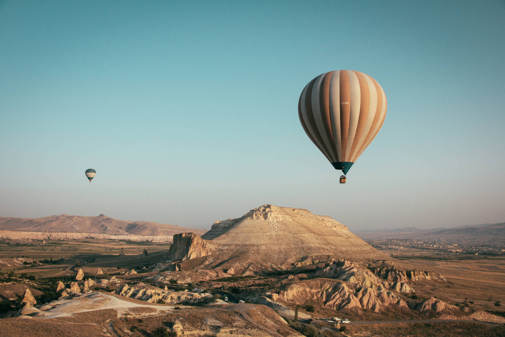 Cappadocia Balloons Near Hill Background