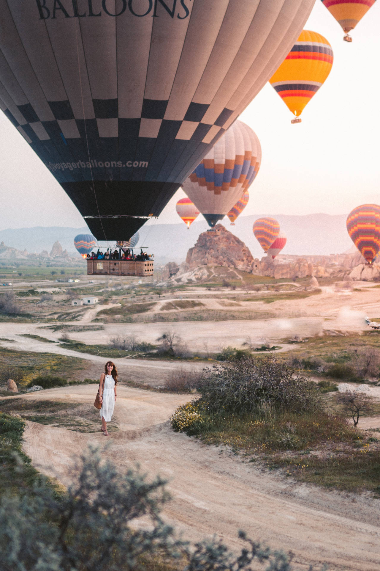 Cappadocia Woman Below Balloons