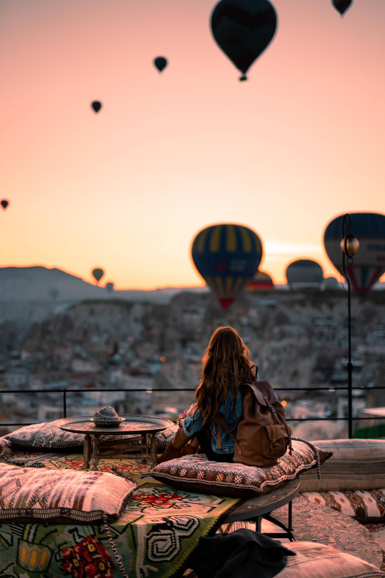 Cappadocia Woman Looking At Balloons Background