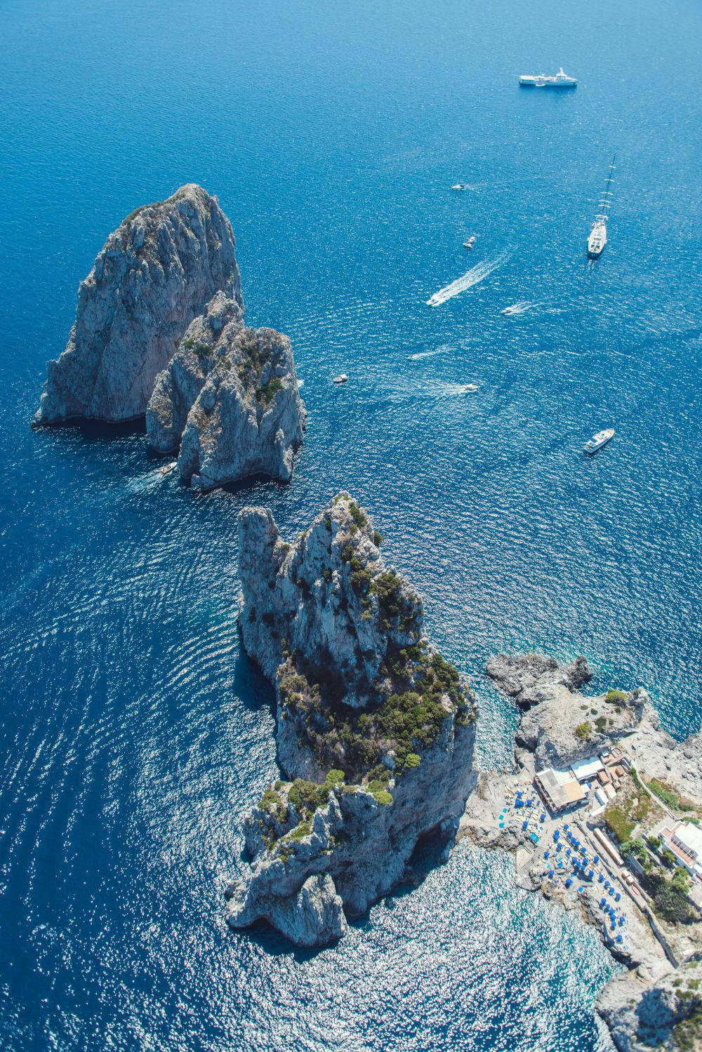 Capri Italy Rock Formations In Sea Background