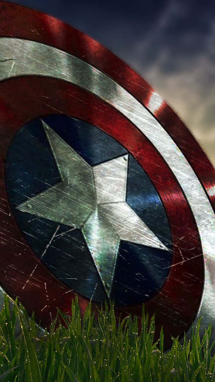 Captain America Android Shield On The Grass Background