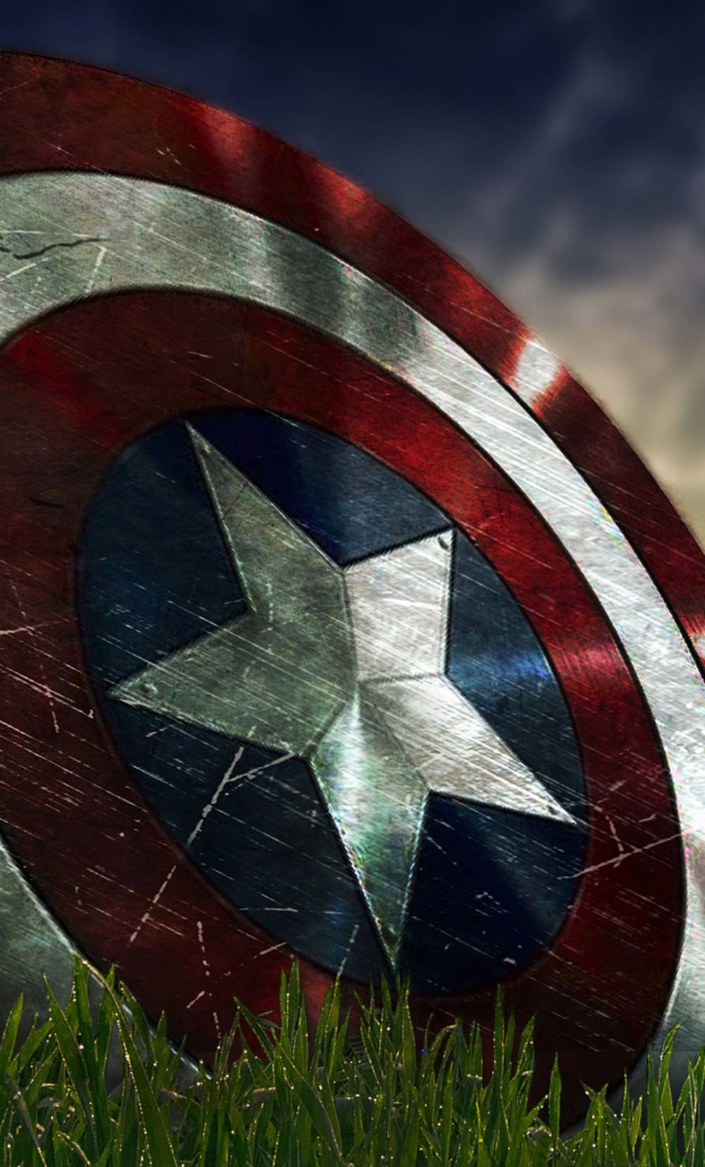 Captain America Shield Iphone On Grass Background