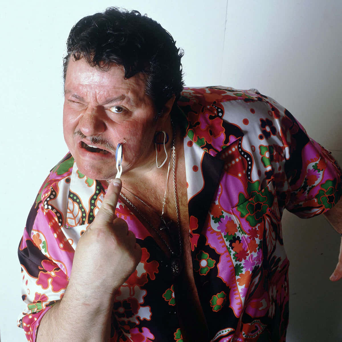 Captain Lou Albano Shaving Beard Background
