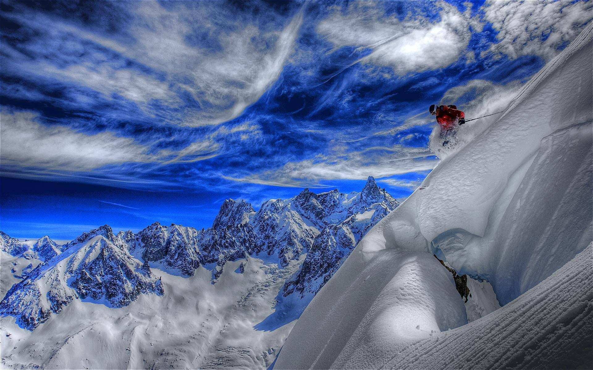 Caption: A Breathtaking View Of Snow Mountain Skiing Background
