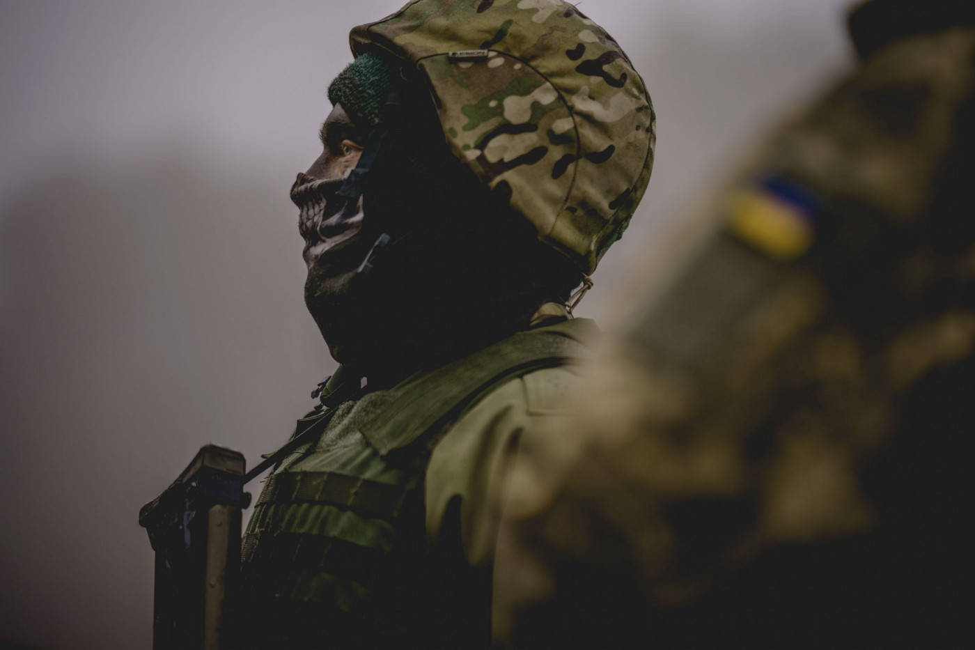 Caption: A British Defense Soldier In Ukrainian Military Uniform Background