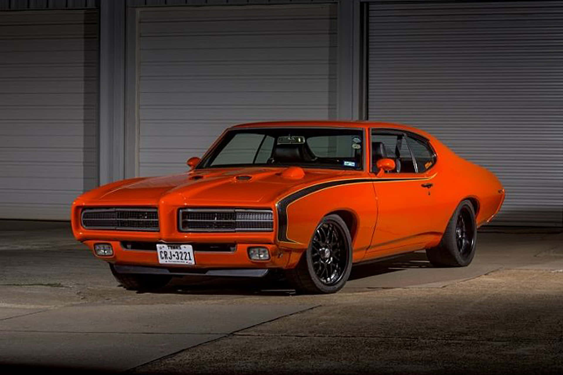 Caption: A Classic Powerhouse - The Pontiac Gto Background