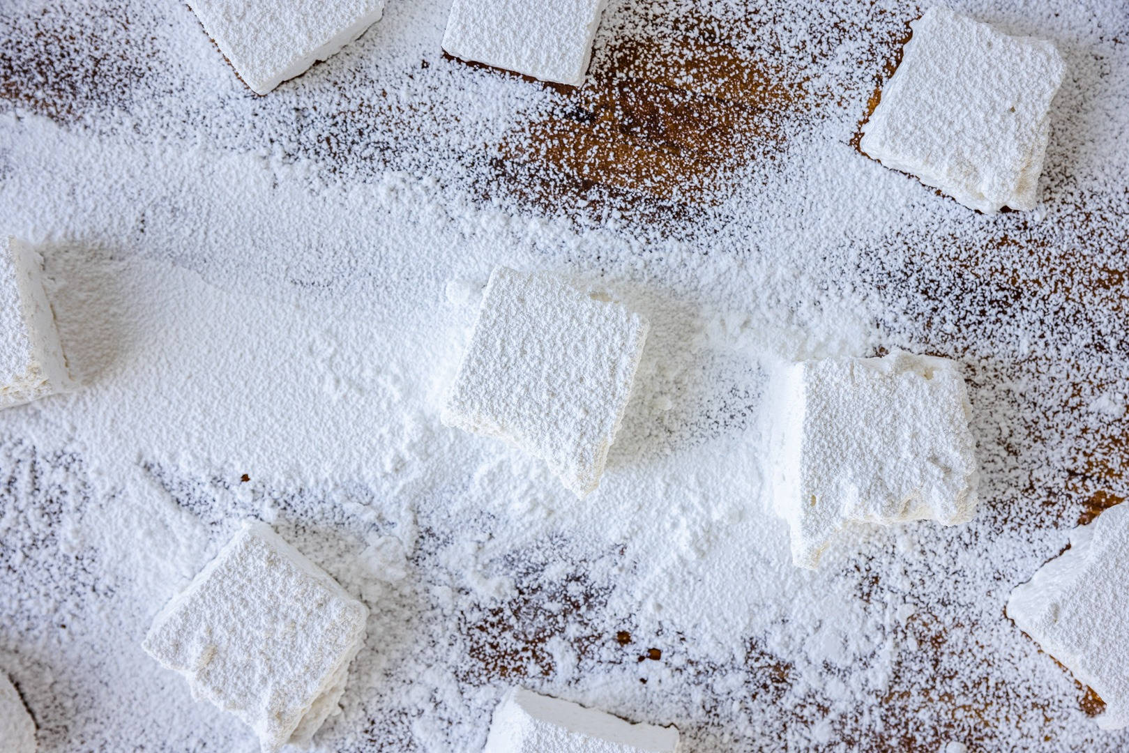 Caption: A Delicious Bite Waiting - Delicate White Marshmallows Background