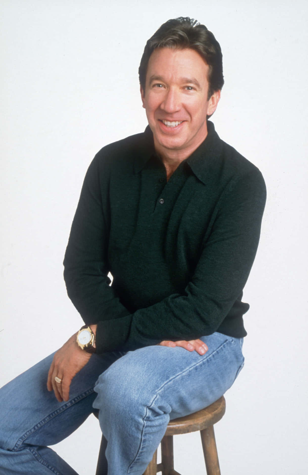 Caption: A Gracious Smile From The Legendary Tim Allen Background