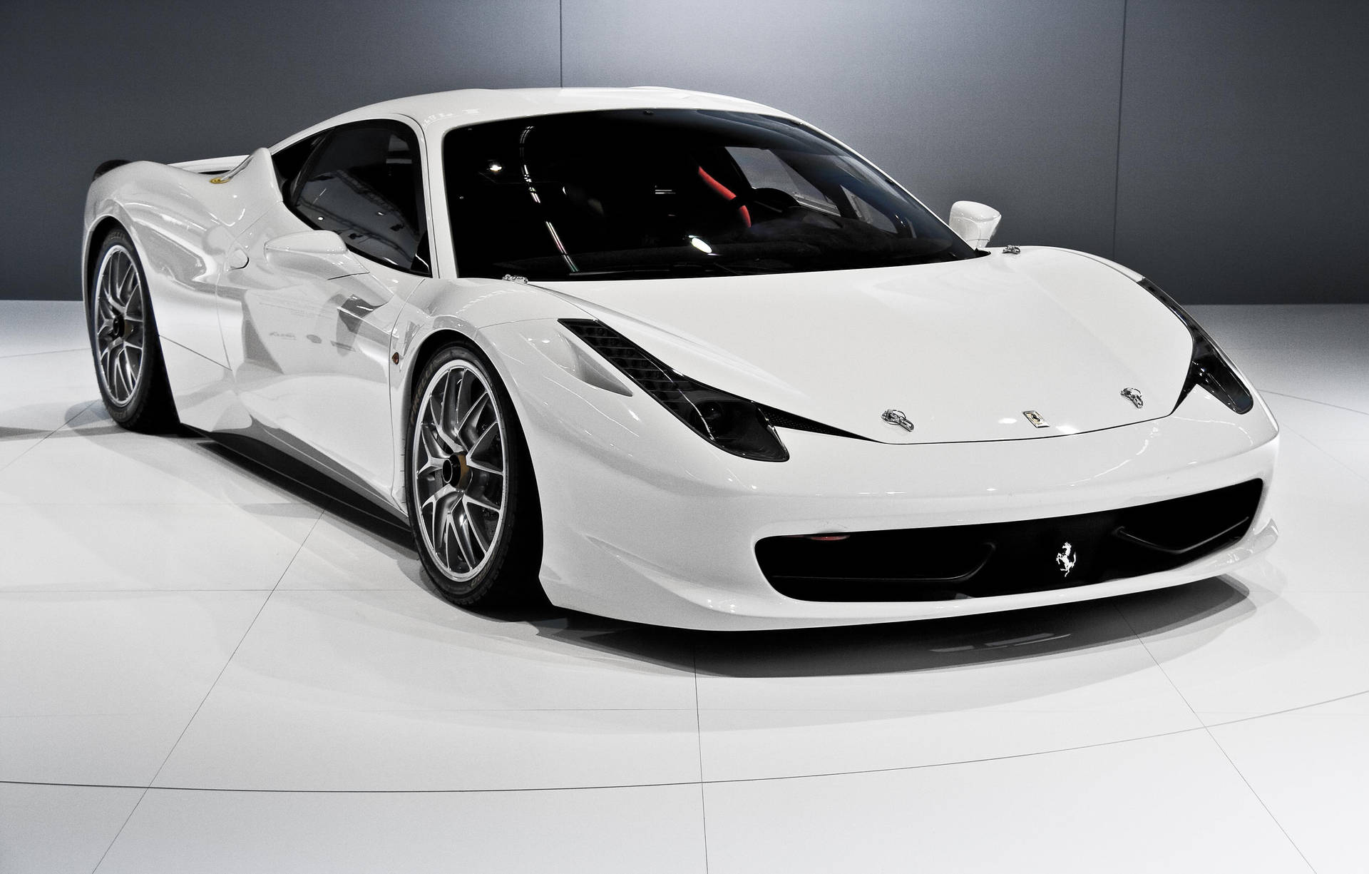 Caption: A Majestic White Ferrari In Full Glory Background