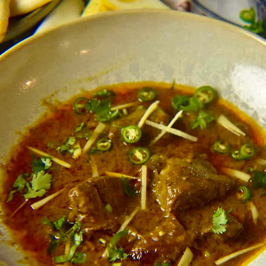 Caption: A Mouth-watering Bowl Of Traditional Nihari Stew Background