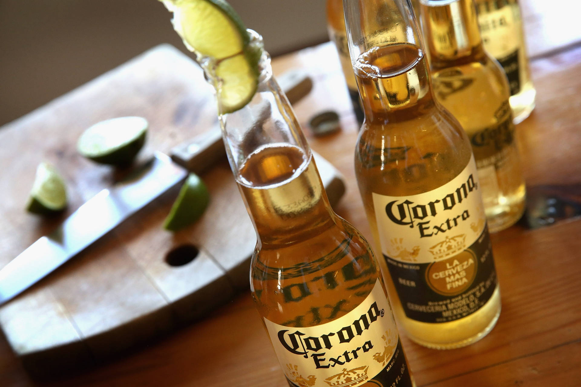 Caption: A Refreshing Corona Beer Bottle Background