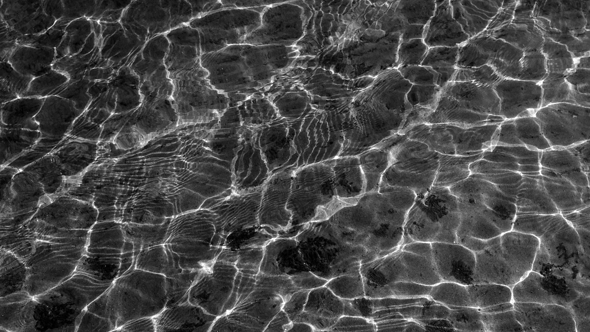 Caption: Abstract Rippling Water Art Background