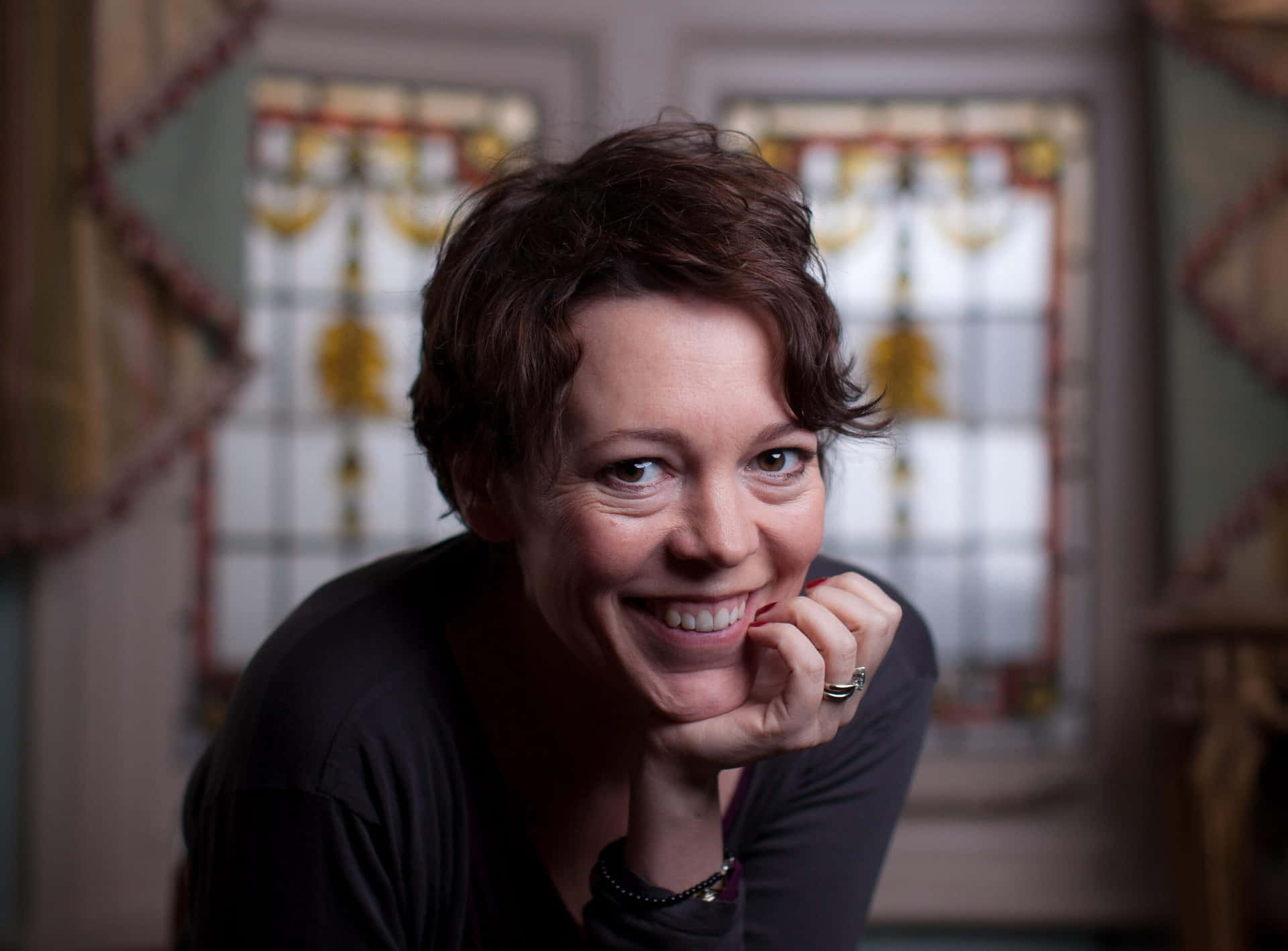 Caption: Academy Award-winning Actress Olivia Colman In An Elegant Pose