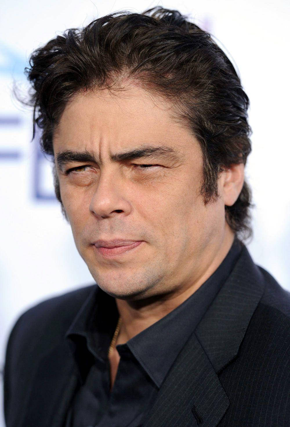 Caption: Acclaimed Actor Benicio Del Toro At The 68th Annual Cannes Film Festival Background