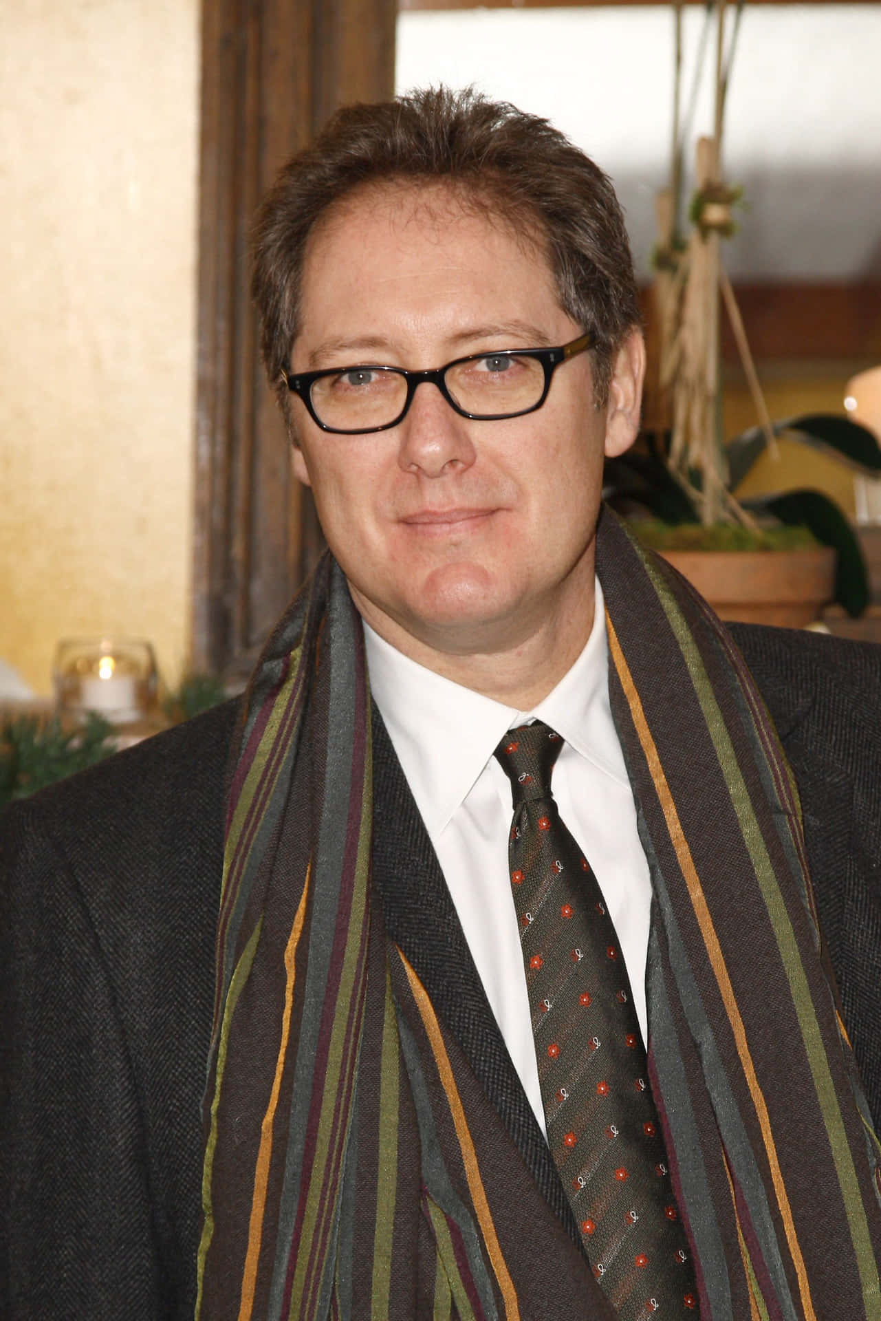Caption: Acclaimed Actor James Spader In A Charming Black And White Portrait. Background