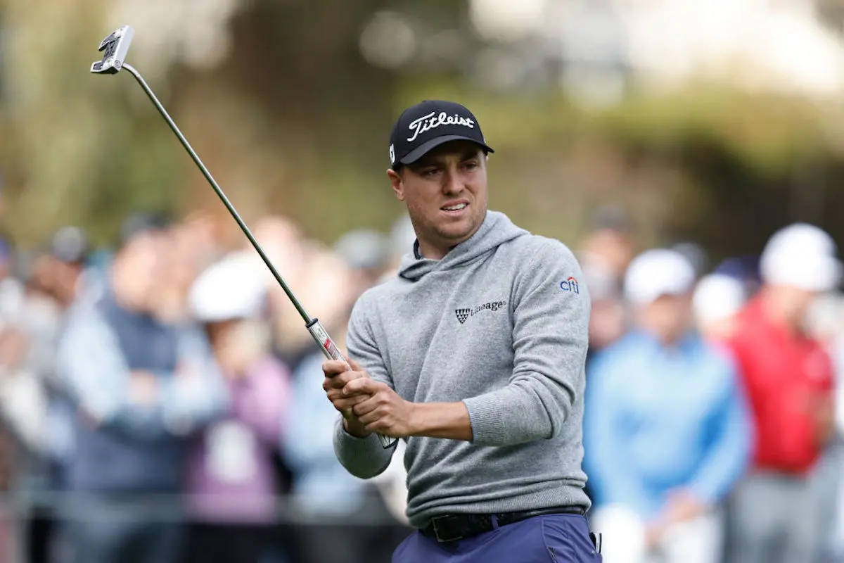 Caption: Acclaimed Golfer Justin Thomas In Gray Hoodie