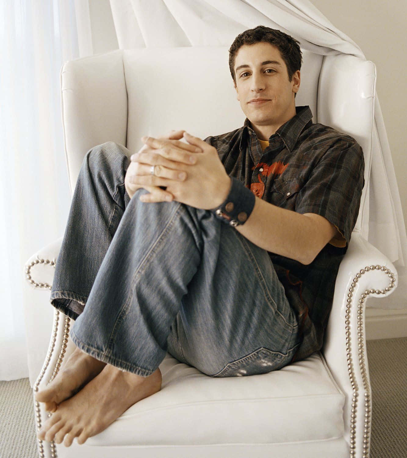 Caption: Actor Jason Biggs Poses In A Casual Style. Background