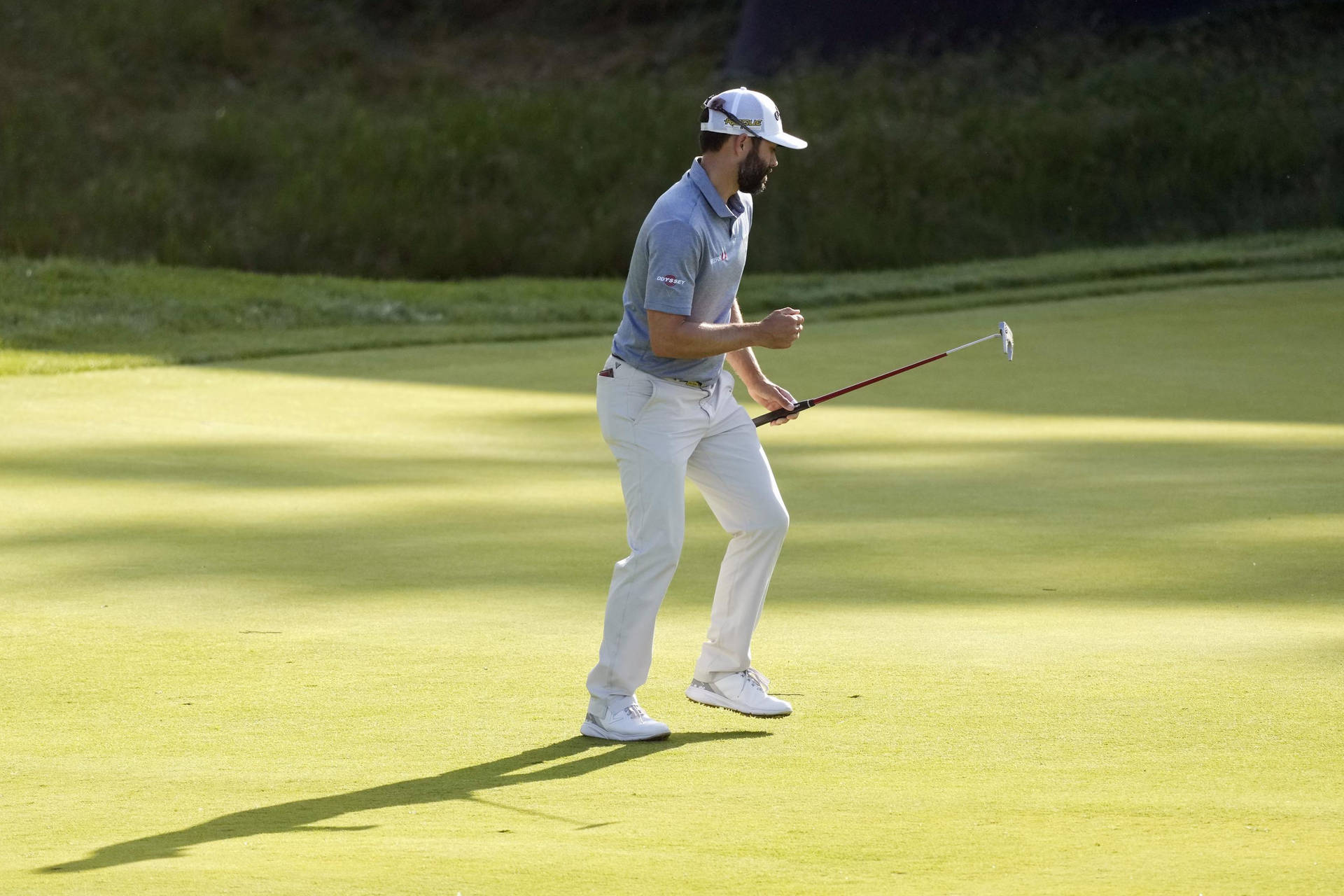 Caption: Adam Hadwin In Action At The Tournament Background