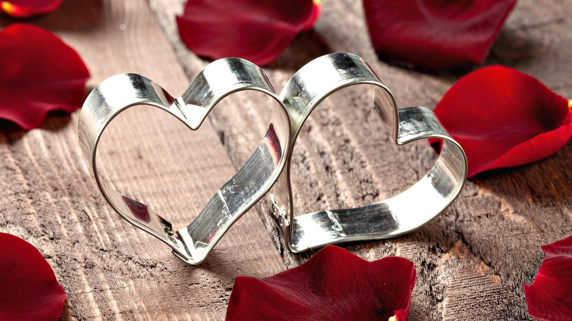 Caption: Adorable Heart-shaped Metal Trinket Close Up Background