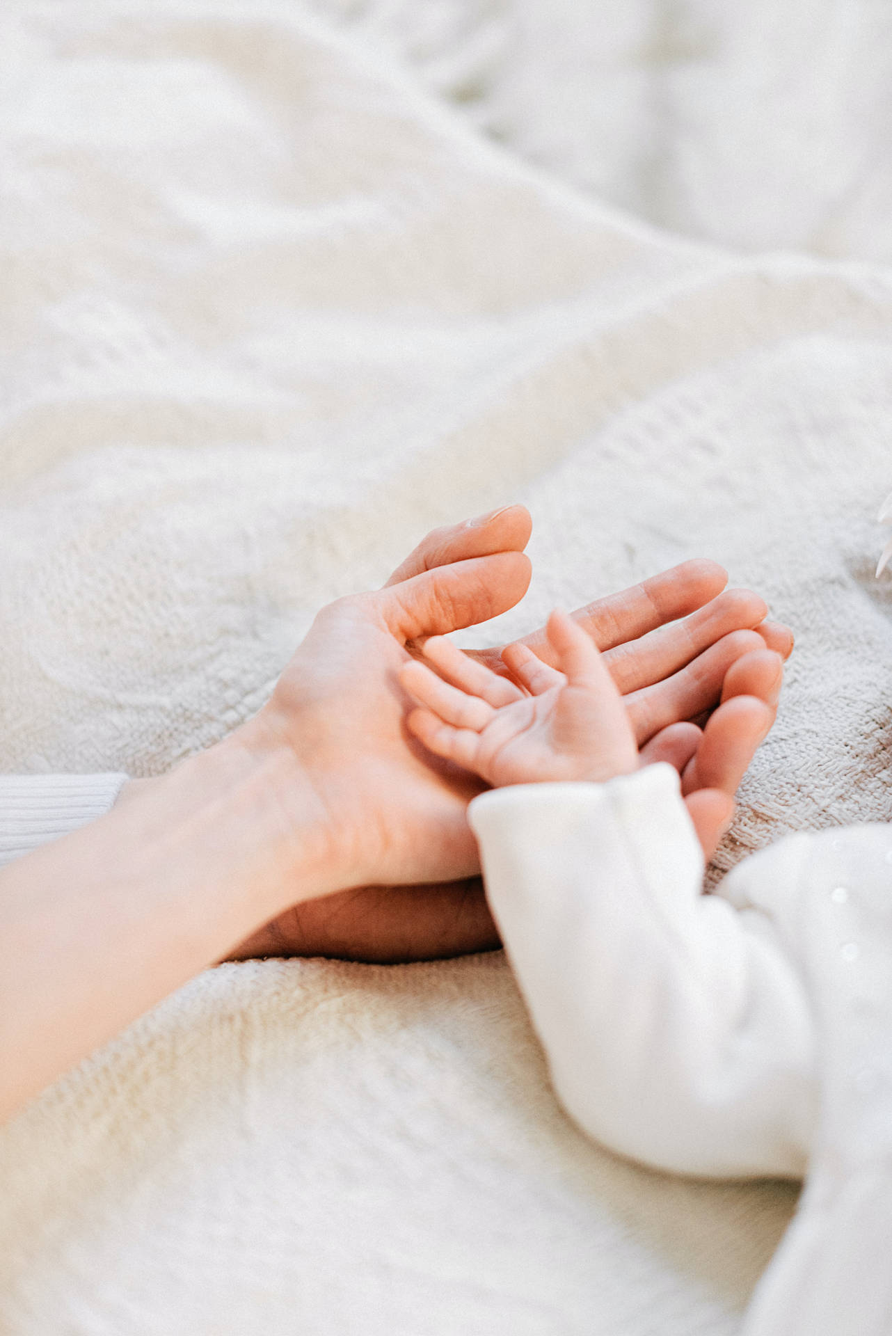 Caption: Adorable Newborn Baby Girl In White Linen Background