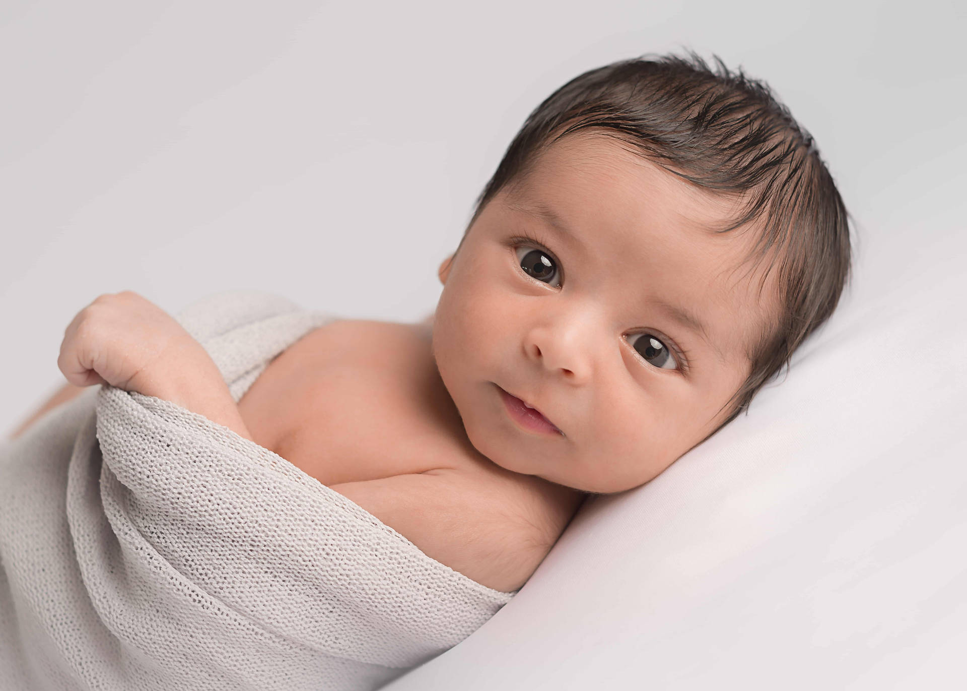 Caption: Adorable Newborn Baby Sleeping Peacefully Background