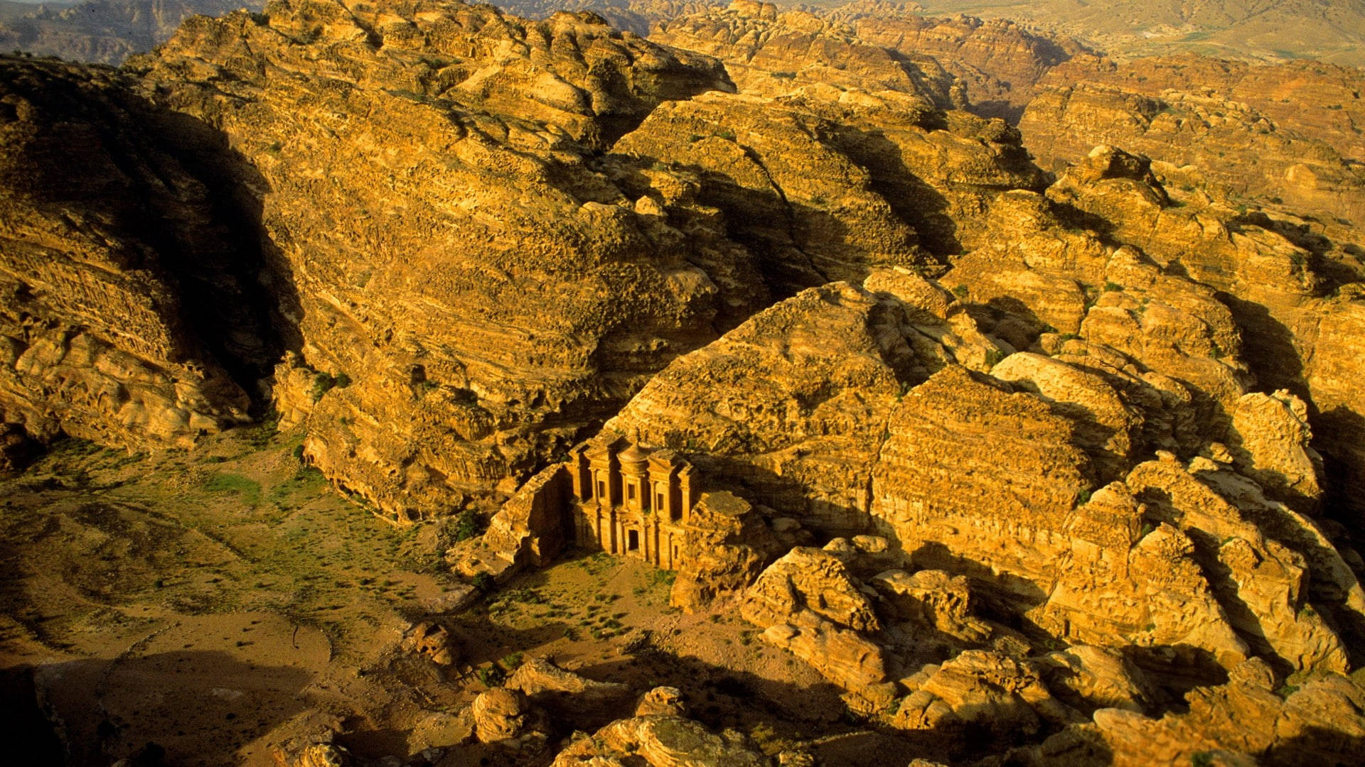 Caption: Aerial View Of The Mesmerizing Petra, Jordan Background