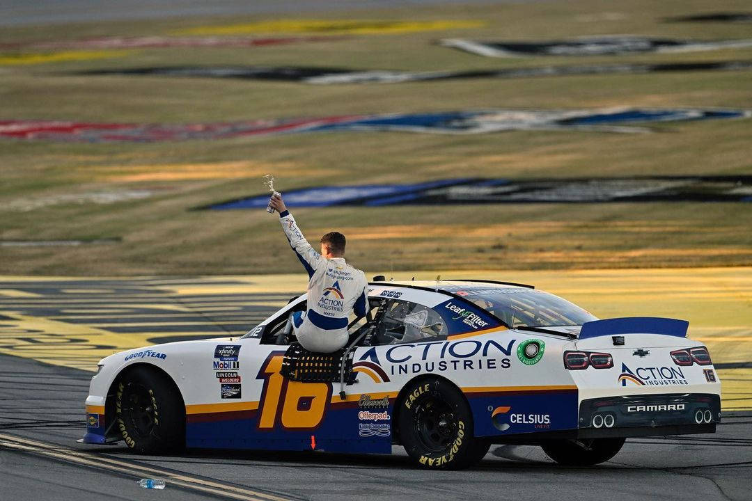 Caption: Aj Allmendinger Victorious Celebration