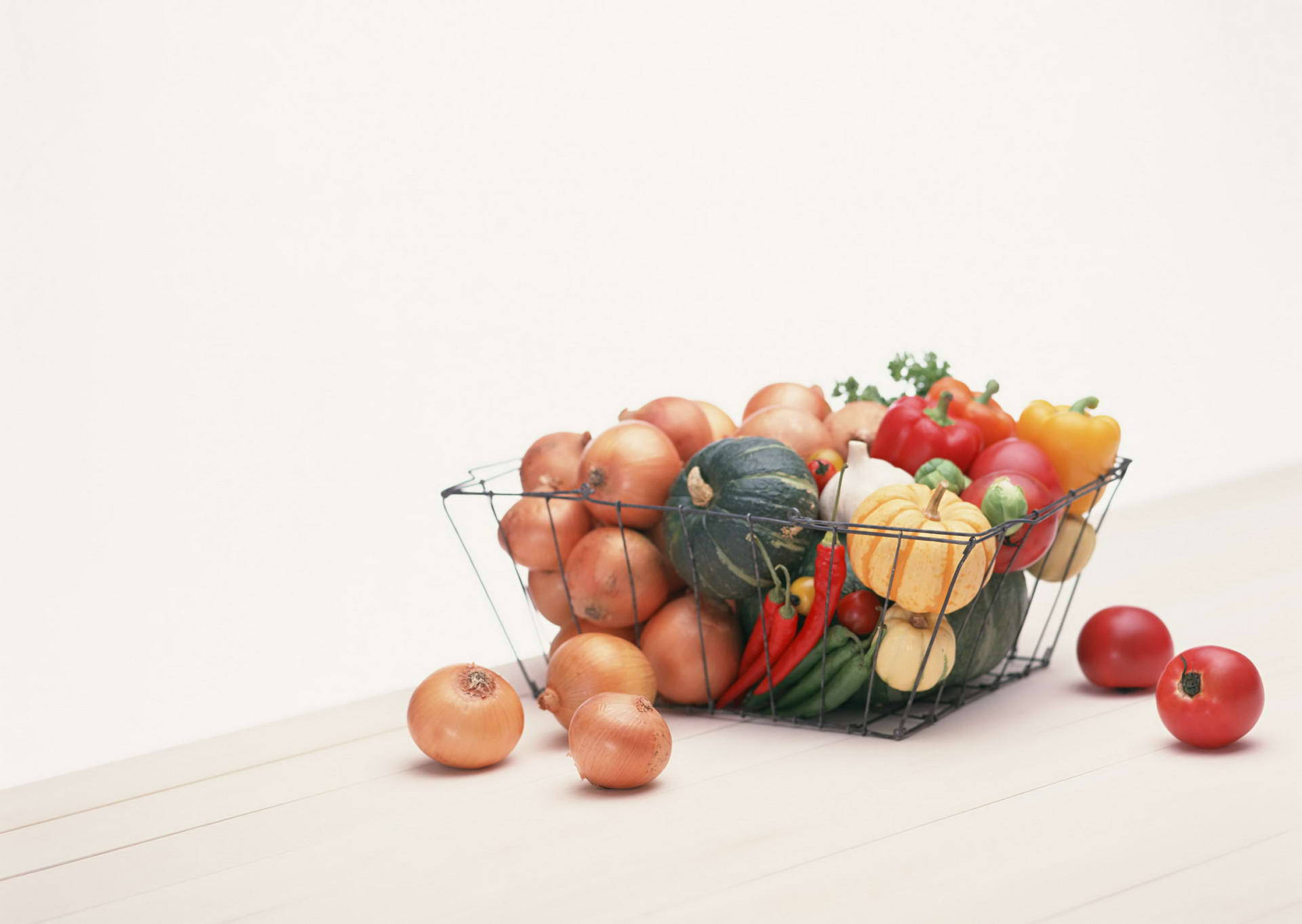 Caption: An Enlivened Basket Of Fresh Vegetables Background