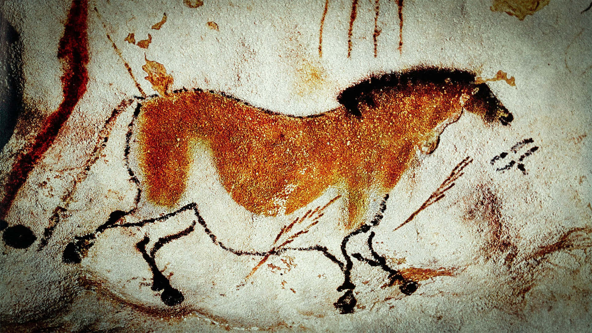 Caption: Ancient Artistry At Lascaux Caves Background