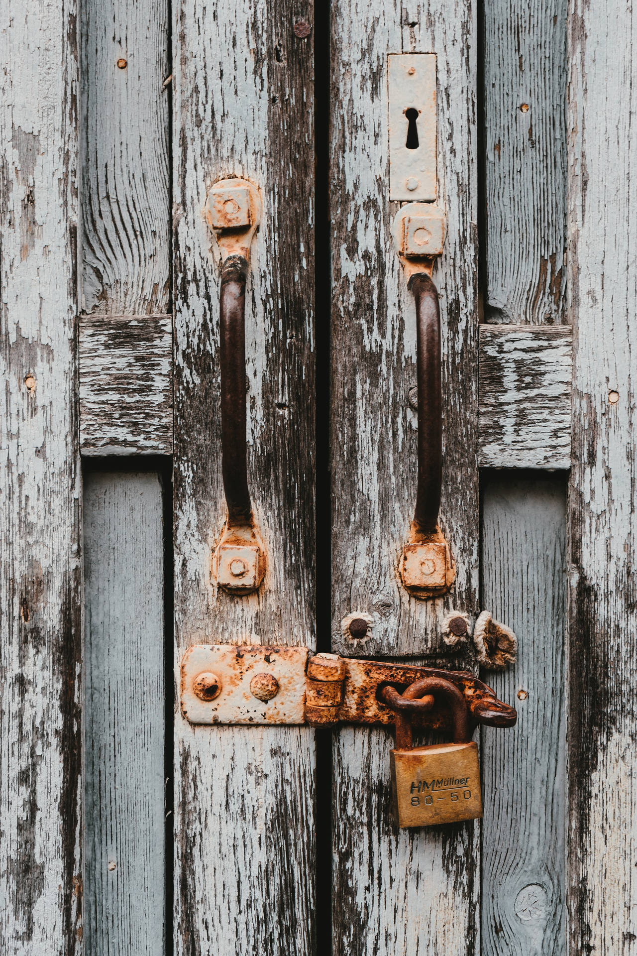 Caption: Antique Double Door With Rusted Latch Background